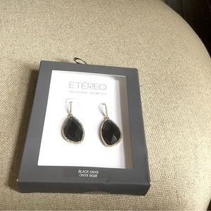 Gold tone earrings with black onyx stone